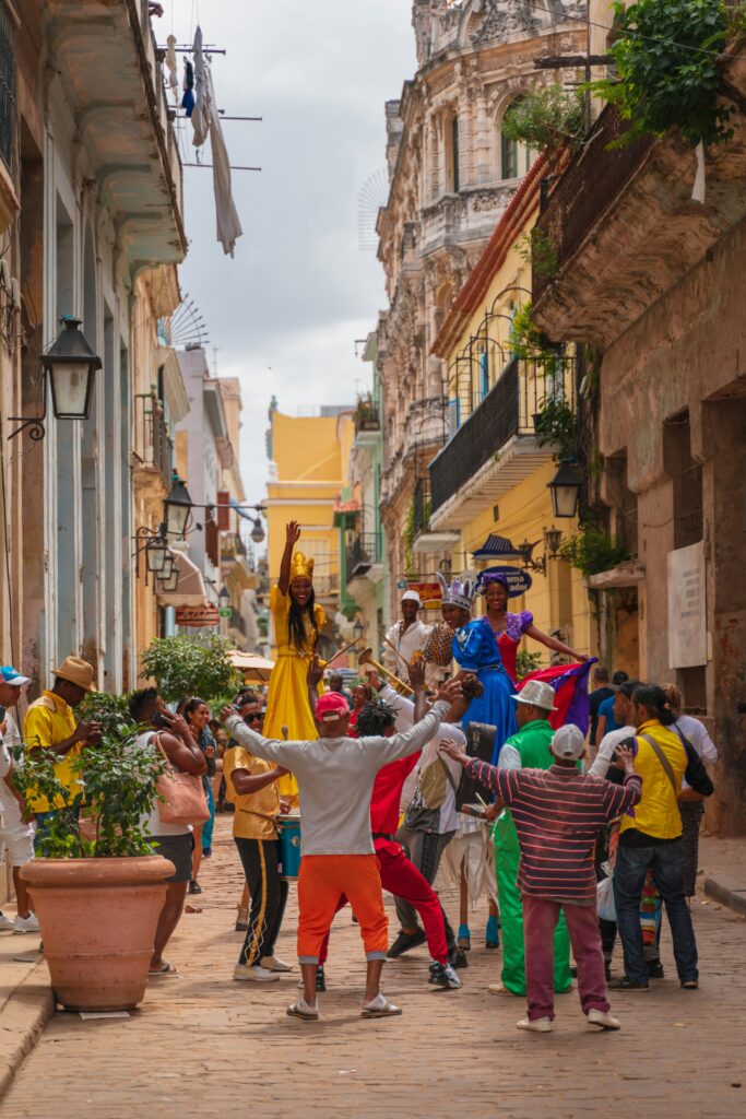 people dancing on street in cuba