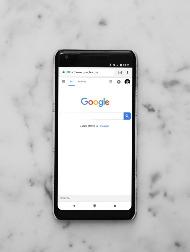 Mobile or cell phone showing google search box on screen gadget