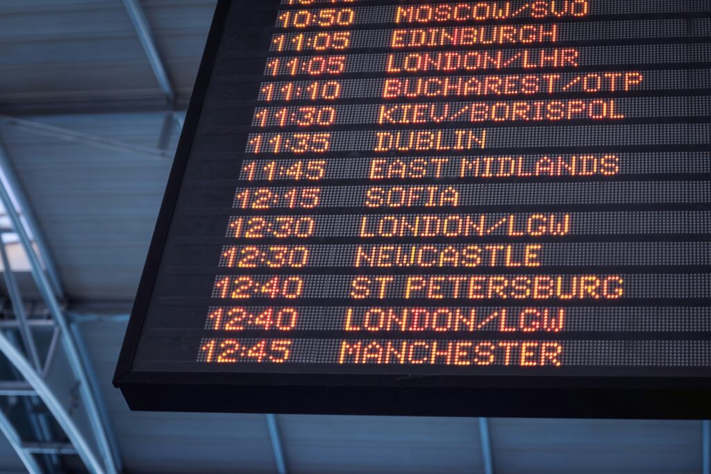 Electronic sign showing times to various destinations