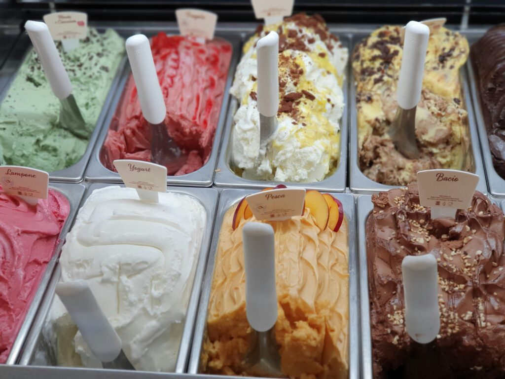 picture of containers of 8 different flavours of ice cream